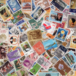Népal 100 timbres de collection tous différents.