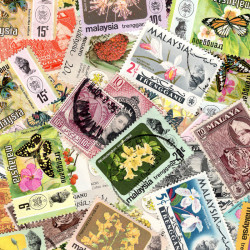Trengganu 25 timbres de collection tous différents.