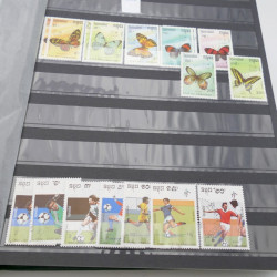 Lot de timbres de Cambodge 1965-2001 neufs et oblitérés en album.