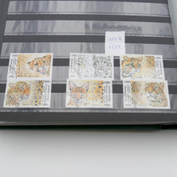 Lot de timbres de Cambodge 1965-2001 neufs et oblitérés en album.