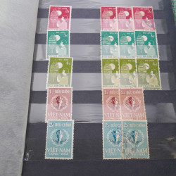Lot de timbres de Vietnam neufs et oblitérés en 7 albums.