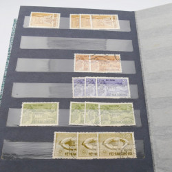 Lot de timbres de Vietnam neufs et oblitérés en 7 albums.