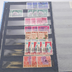 Lot de timbres de Vietnam neufs et oblitérés en 7 albums.