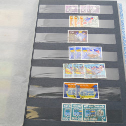 Lot de timbres de Vietnam neufs et oblitérés en 7 albums.