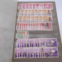 Lot de timbres de Vietnam neufs et oblitérés en 7 albums.