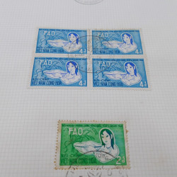 Lot de timbres de Vietnam neufs et oblitérés en 7 albums.