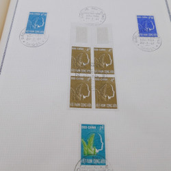 Lot de timbres de Vietnam neufs et oblitérés en 7 albums.