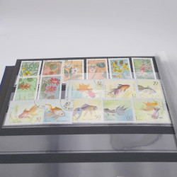 Lot de timbres de Vietnam neufs et oblitérés en 7 albums.