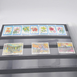 Lot de timbres de Vietnam neufs et oblitérés en 7 albums.