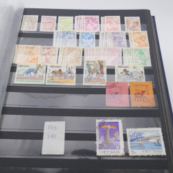 Lot de timbres de Vietnam neufs et oblitérés en 7 albums.