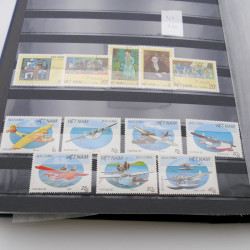 Lot de timbres de Vietnam neufs et oblitérés en 7 albums.