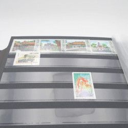 Lot de timbres de Vietnam neufs et oblitérés en 7 albums.