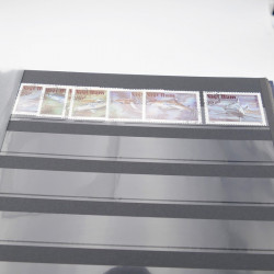 Lot de timbres de Vietnam neufs et oblitérés en 7 albums.