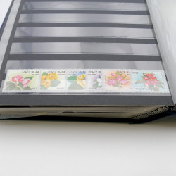 Lot de timbres de Vietnam neufs et oblitérés en 7 albums.