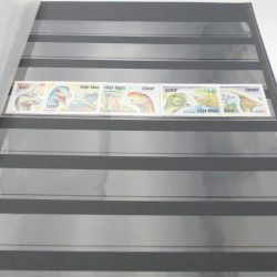 Lot de timbres de Vietnam neufs et oblitérés en 7 albums.
