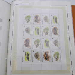Lot massif de timbres de Monaco neufs et oblitérés en 6 albums.