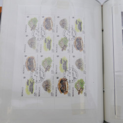 Lot massif de timbres de Monaco neufs et oblitérés en 6 albums.