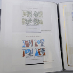 Lot massif de timbres de Monaco neufs et oblitérés en 6 albums.