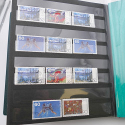 Lot massif de timbres d'Allemagne neufs et oblitérés en 6 albums.