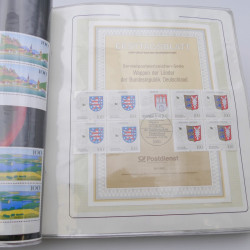 Lot massif de timbres d'Allemagne neufs et oblitérés en 6 albums.