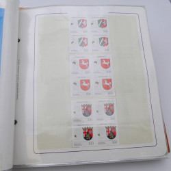Lot massif de timbres d'Allemagne neufs et oblitérés en 6 albums.