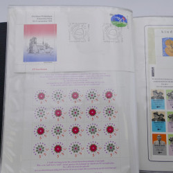 Lot de timbres de Pays-Bas neufs et oblitérés en 2 albums.