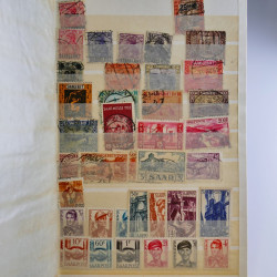 Vrac philatélique de timbres d'Allemagne et Suisse en un carton.
