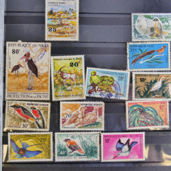 Vrac philatélique de timbres du monde en un carton.