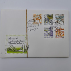Lot de 300 enveloppes premier jour d'émission de Suisse 1960-1999 en boite.