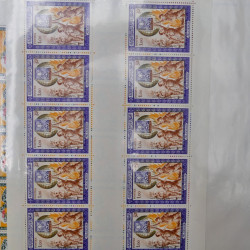 Lot de timbres du monde neufs et oblitérés en album