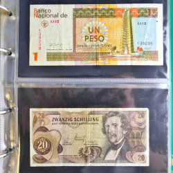 Lot de 50 billets de banque anciens du monde en album.
