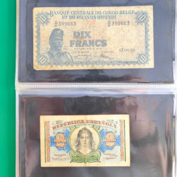 Lot de 50 billets de banque anciens du monde en album.
