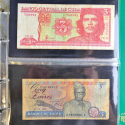 Lot de 50 billets de banque anciens du monde en album.