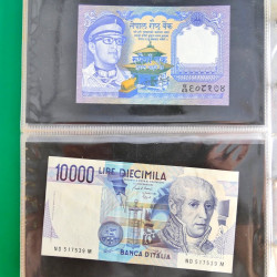 Lot de 50 billets de banque anciens du monde en album.