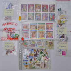 Vrac philatélique de timbres du monde en un carton.