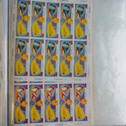 Lot de timbres en feuilles divers pays, thématiques, variétés en album.
