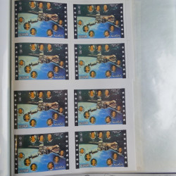 Lot de timbres en feuilles divers pays, thématiques, variétés en album.