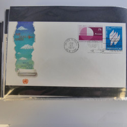 Collection enveloppes FDC timbres des Nations Unies en album.