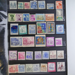 Collection timbres du monde neufs et oblitérés en 8 albums.