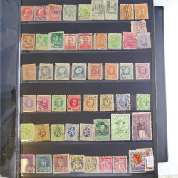 Collection timbres du monde neufs et oblitérés en 8 albums.