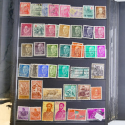 Collection timbres du monde neufs et oblitérés en 8 albums.