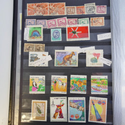 Collection timbres du monde neufs et oblitérés en 8 albums.