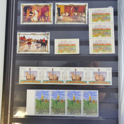 Collection timbres du monde neufs et oblitérés en 8 albums.