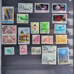 Collection timbres du monde neufs et oblitérés en 8 albums.