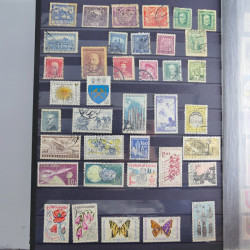 Collection timbres du monde neufs et oblitérés en 8 albums.