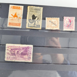 Collection timbres du monde neufs et oblitérés en 8 albums.