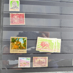 Collection timbres du monde neufs et oblitérés en 8 albums.