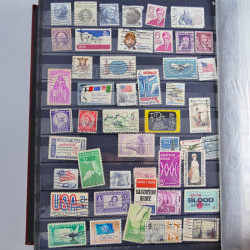 Collection timbres du monde neufs et oblitérés en 8 albums.