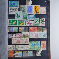 Collection timbres du monde neufs et oblitérés en 8 albums.