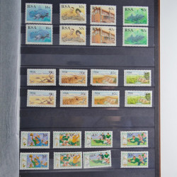 Collection timbres du monde neufs et oblitérés en 8 albums.